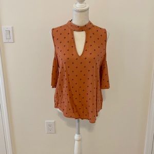 Peek-a-boo shoulder blouse!